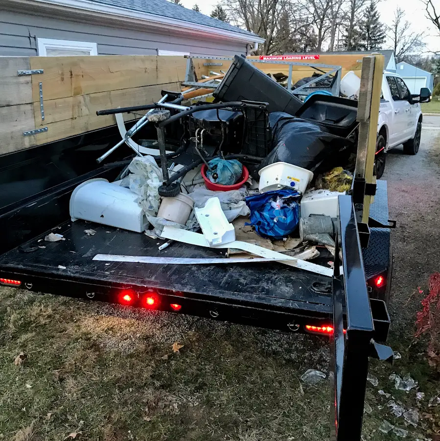 Roll-off dumpster delivered to a residential driveway in St. Simons