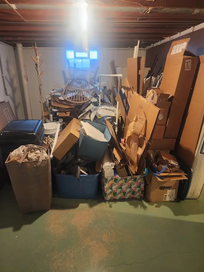 Roll-off dumpster container at job site for 15 Yard Dumpster Rental in St. Simons